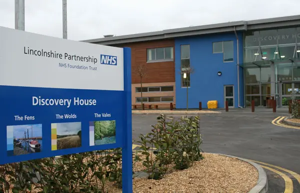 Automated energy management - Omnium logo with a swirl design to the left of the word omnium and the tagline Making Energy Make Sense written below in green text.