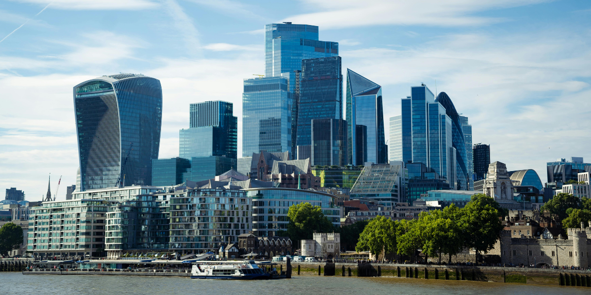 Automated energy management - Omnium logo with a swirl design to the left of the word omnium and the tagline Making Energy Make Sense written below in green text.